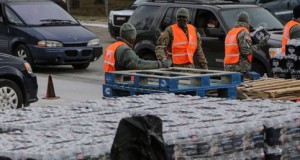 Walmart, others promise water to Flint