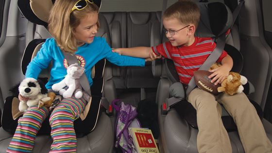 children in backseat of car