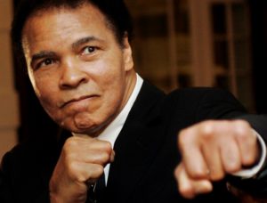 Muhammad Ali poses during the World Economic Forum in Davos, Switzerland January 2006. REUTERS/Andreas Meier