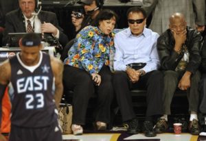 Muhammad Ali watches during the first quarter of the NBA All-Star basketball game in Phoenix, February 2009. REUTERS/Rick Scuteri