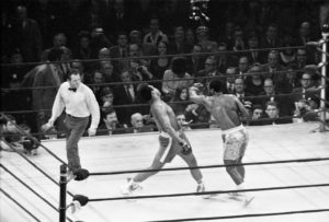 Joe Frazier lands a left hook on Muhammad Ali during the first of their three epic battles at Madison Square Garden in New York, March 1971. Action Images / MSI/File Photo