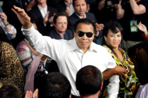 Boxing legend Muhammad Ali stands with his wife Yolanda as he is introduced before the welterweight fight between Floyd Mayweather Jr. and Shane Mosley at the MGM Grand Garden Arena in Las Vegas, Nevada in this May 1, 2010 file photo. REUTERS/Steve Marcus/File Photo