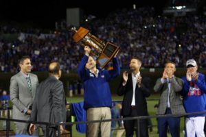 Oct 22, 2016; Chicago, IL, USA; Chicago Cubs owner Tom Ricketts raises the National League Championship Trophy after game six of the 2016 NLCS playoff baseball series at Wrigley Field. Mandatory Credit: Jerry Lai-USA TODAY Sports
