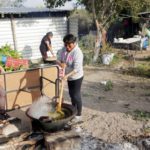 Monica Arroyo prepares dinner at a community event in the village of Capula in Ixmiquilpan, Mexico