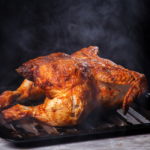 freepik/Food. Delicious, grilled chicken on the table