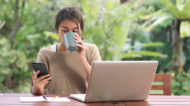https://www.freepik.com/free-photo/freelance-asian-woman-working-home-business-female-working-laptop-using-mobile-phone-drinking-coffee-sitting-table-garden-morning_5820701.htm