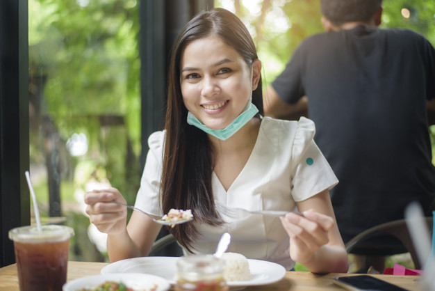 https://www.freepik.com/premium-photo/young-woman-with-face-mask-is-having-food-restaurant-new-normal-concept_9102365.htm#page=3&query=mask+restaurant&position=22