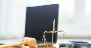 https://www.freepik.com/free-photo/close-up-golden-justice-scale-wooden-desk-courtroom_2824779.htm#page=1&query=courtroom&position=42