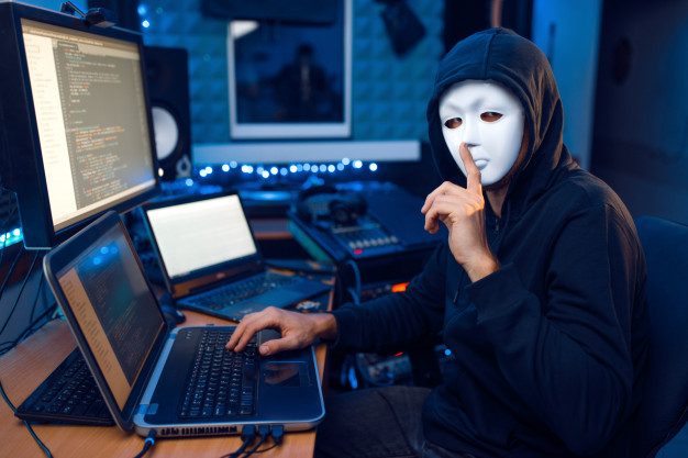 https://www.freepik.com/premium-photo/hacker-mask-hood-sitting-his-workplace-with-laptop-pc-network-account-hacking_9682768.htm