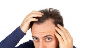 https://www.freepik.com/premium-photo/man-controls-hair-loss_4152144.htm#page=1&query=man%20checking%20hairline&position=4