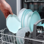 freepik/man-empty-out-dishwasher-kitchen-close-up-male-hands-loading-dishes-dishwasher_98774-190