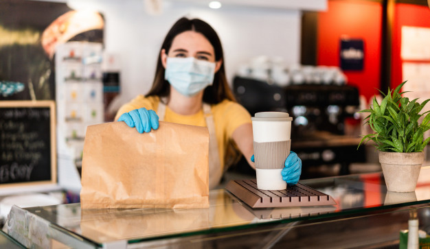 https://www.freepik.com/premium-photo/young-woman-wearing-face-mask-while-serving-takeaway-breakfast-coffee-inside-cafeteria-restaurant_8832848.htm#page=4&query=covid+business&position=34