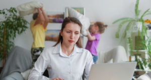 https://www.freepik.com/premium-photo/young-mother-works-home-with-laptop-children-interfere-with-remote-work_7589833.htm