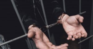 https://www.freepik.com/premium-photo/man-handcuffs-bars-police-station_4873356.htm#page=3&query=criminal&position=18