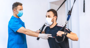 https://www.freepik.com/premium-photo/physiotherapist-blue-gown-with-patient-stretching-with-rubber-bands-upside-down-physiotherapy-with-protective-measures-coronavirus-pandemic-covid-19-osteopathy-sports-chiromassage_8418757.htm#page=4&query=physical+rehab&position=23