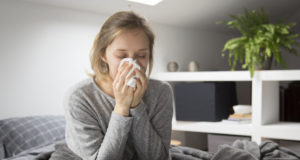 https://www.freepik.com/free-photo/sick-woman-sitting-bed-blowing-nose-with-napkin_4167100.htm#page=1&query=flu&position=6