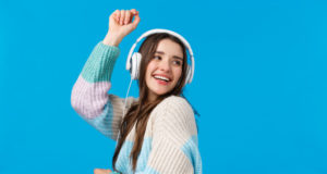 https://www.freepik.com/premium-photo/waist-up-portrait-carefree-happy-dancing-woman-headphones-smiling-raising-hands-up-free-upbeat-enjoying-favorite-songs-special-winter-holidays-playlisty-laughing-joyfully-blue_6863307.htm