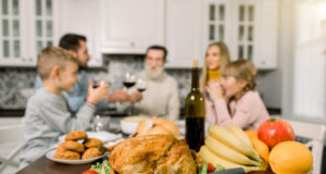 https://www.freepik.com/premium-photo/family-sitting-table-celebrating-holiday-grandfather-mother-father-children-traditional-turket-fruits-wine-table-focus-turkey_9140553.htm