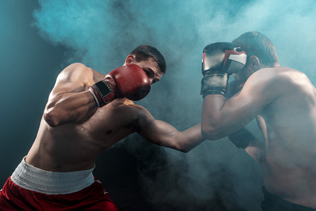 https://www.freepik.com/free-photo/two-professional-boxer-boxing-black-smoky-space_9368309.htm#page=3&query=boxing&position=43