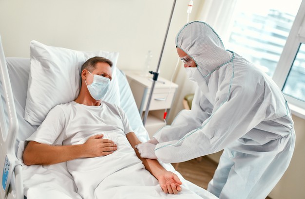 https://www.freepik.com/premium-photo/doctor-protective-suit-respirator-goggles-puts-iv-drip-mature-patient-who-is-lying-modern-hospital-ward-during-coronavirus-covid-19-epidemic_12137583.htm#page=1&query=covid%20hospital%20bed&position=19