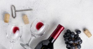 https://www.freepik.com/free-photo/flat-lay-red-wine-bottle-table_6595516.htm