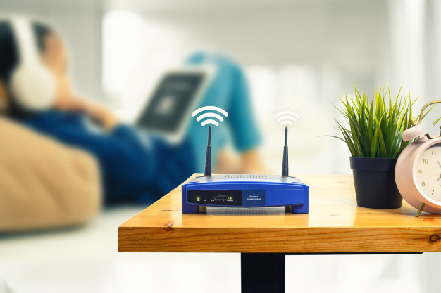 https://www.freepik.com/premium-photo/closeup-wireless-router-man-using-smartphone-living-room-home-office_4151722.htm#page=1&query=wifi+router&position=15