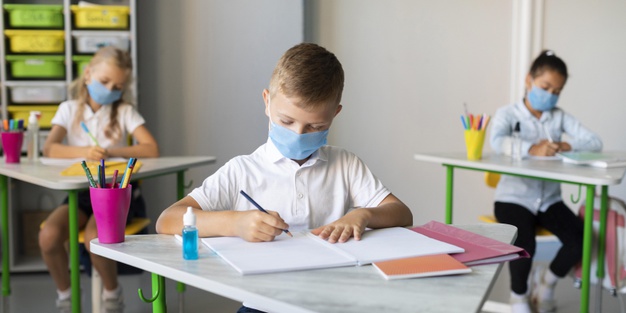 https://www.freepik.com/free-photo/kids-writing-classroom-while-wearing-medical-masks_10133906.htm#page=1&query=covid%20school&position=9