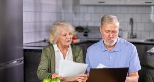 https://www.freepik.com/premium-photo/aged-couple-checking-finances-home-using-laptop-discussing-planning-budget-together-using-online-banking-services-calculator-holding-documents-kitchen_12715402.htm#page=2&query=worried+couple+laptop&position=16