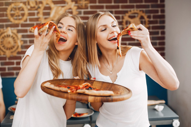https://www.freepik.com/free-photo/cute-friends-cafe-eatting-pizza_4975086.htm#page=1&query=people%20eating%20pizza&position=15