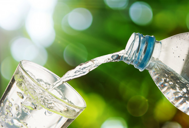 https://www.freepik.com/premium-photo/drinking-water-is-poured-from-bottle-into-glass-green-bokeh-background_3017737.htm#page=1&query=hydrating&position=5