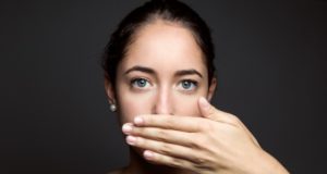 https://www.freepik.com/free-photo/beautiful-young-woman-covering-her-mouth-with-hand-isolated_1139811.htm