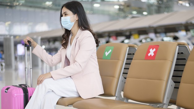 https://www.freepik.com/premium-photo/business-woman-is-wearing-protective-mask-international-airport-travel-covid-19-pandemic-safety-travels-social-distancing-protocol-new-normal-travel-concept_9923423.htm