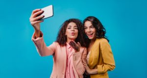 https://www.freepik.com/free-photo/amazing-woman-yellow-jacket-posing-while-her-friend-taking-picture_12306612.htm#page=2&query=selfie&position=38