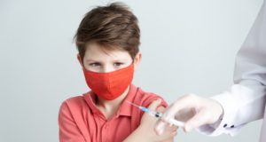 https://www.freepik.com/premium-photo/child-medical-mask-is-vaccinated-against-coronavirus-covid-pandemic_14280990.htm?query=covid%20children%20vaccine