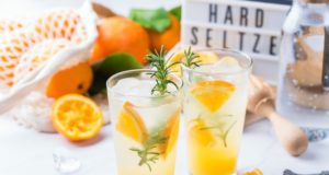 https://www.freepik.com/premium-photo/hard-seltzer-cocktail-with-orange-rosemary-ice-table-summer-refreshing-beverage-drink-white-table_13162314.htm#page=1&query=hard%20seltzer&position=46