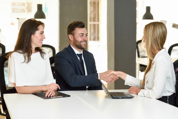 https://www.freepik.com/free-photo/smiling-young-couple-shaking-hands-with-insurance-agent_1174210.htm#page=1&query=investing%20couple&position=8