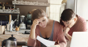 https://www.freepik.com/free-photo/young-married-couple-facing-financial-problem-during-economic-crisis-frustrated-woman-unhappy-man-studying-utility-bill-kitchen-shocked-with-amount-be-paid-gas-electricity_9532755.htm#page=1&query=family%20economics&position=25