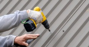 https://www.freepik.com/premium-photo/male-hands-gloves-with-screwdriver-screw-roofing-sheet-roof_14700689.htm?query=metal%20roof