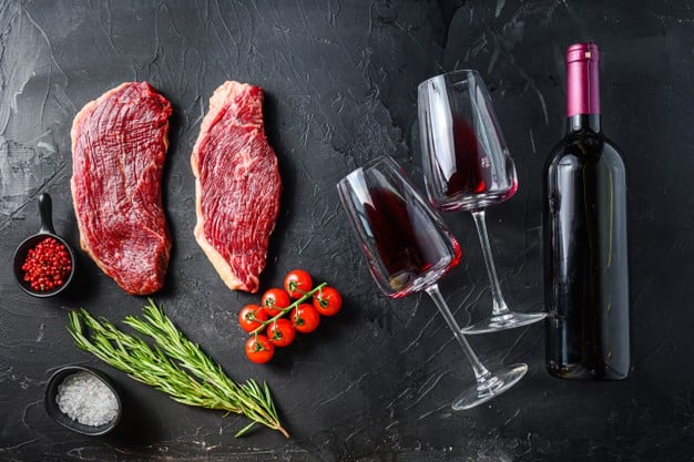 https://www.freepik.com/premium-photo/organic-picanha-steaks-near-bottle-glass-red-wine-black-textured-table-top-view_13789224.htm