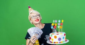 https://www.freepik.com/free-photo/smiling-young-blonde-party-woman-wearing-glasses-birthday-cap-holding-birthday-cake-with-stars-money-gift-box-paper-bag-looking-side-isolated-green-wall-with-copy-space_13954595.htm?query=party