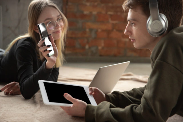 https://www.freepik.com/premium-photo/attractive-young-couple-using-devices-together-tablet-laptop-smartphone-headphones-wireless-communication-gadgets-concept-technologies-connecting-people-self-insulation-lifestyle-home_15697389.htm?query=family%20devices