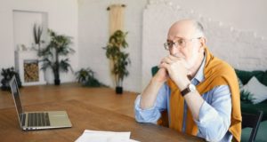 https://www.freepik.com/free-photo/indoor-shot-unhappy-sad-senior-bearded-male-entrepreneur-sitting-desk-with-laptop-papers-having-depressed-facial-expression-frustrated-with-financial-problems-holding-hands-his-chin_11893078.htm#page=1&query=retirement%20account&position=37