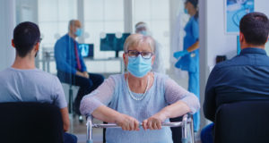 https://www.freepik.com/free-photo/disabled-senior-woman-with-face-mask-against-coronavirus-walking-frame-looking-camera-hospital-waiting-area-nurse-assisting-doctor-during-consultation-examination-room_16167909.htm#page=1&query=covid%20waiting%20room&position=31