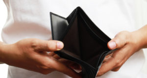 https://www.freepik.com/premium-photo/man-opens-empty-leather-wallet-with-no-money-empty-pocket-very-poor_16728200.htm?query=debt