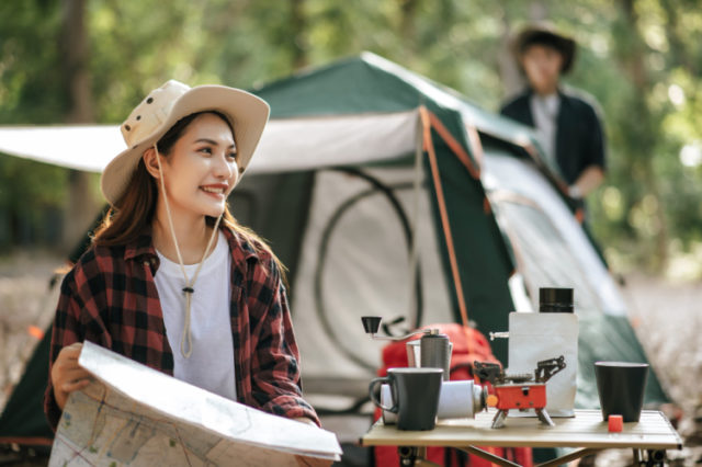 https://www.freepik.com/premium-photo/selective-focus-pretty-woman-sitting-chair-front-camping-tent-checking-direction-paper-map-handsome-boyfriend-pitching-tent-her-they-happy-camping-forest-vacation_16307626.htm?query=camping%20gear
