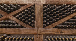 https://www.freepik.com/premium-photo/winy-bottles-lie-shelving-from-thick-logs-old-wine-cellars-with-bottles-barrels_17075633.htm?query=wine%20store