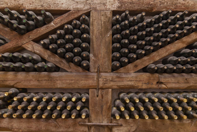 https://www.freepik.com/premium-photo/winy-bottles-lie-shelving-from-thick-logs-old-wine-cellars-with-bottles-barrels_17075633.htm?query=wine%20store