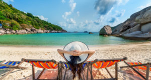 https://www.freepik.com/free-photo/woman-with-hat-sitting-chairs-beach-beautiful-tropical-beach-woman-relaxing-tropical-beach-koh-nangyuan-island_13250006.htm#page=1&query=luxury%20vacation&position=1