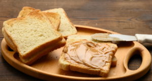 https://www.freepik.com/premium-photo/peanut-butter-square-slice-white-wheat-flour-breakfast_18230495.htm#page=3&query=bread%20spread&position=41