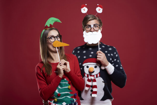 https://www.freepik.com/free-photo/young-couple-weird-christmas-clothes_13251435.htm?query=christmas%20ugly%20sweater